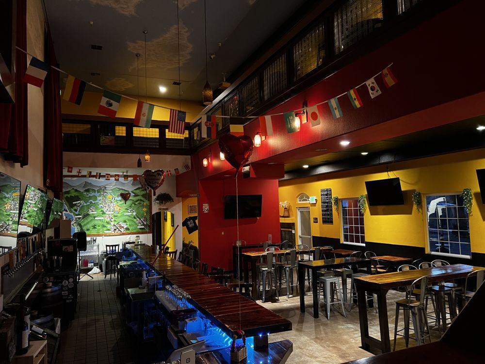 The lit bar inside the taproom